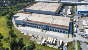 an aerial view of a large industrial building - Forensic Testing